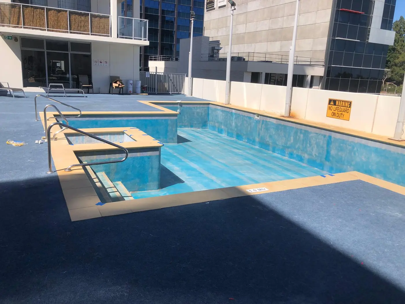 Worn fibreglass pool surface before restoration by the experienced team behind Reviva Pool